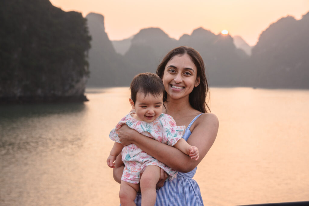 Author and baby, sunset at Halong bay Vietnam